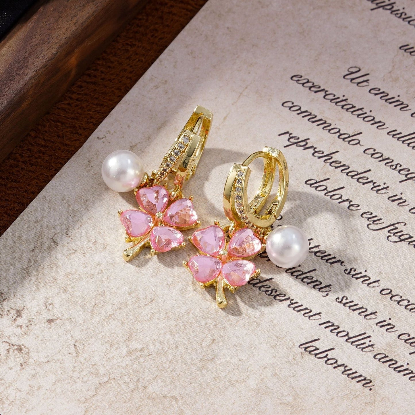 Buy 1 Get 1 Free🌸Fashion crystal four-petal flower pearl earrings